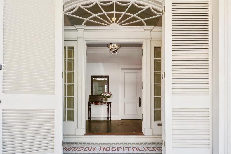 Tiled Entryway Floor Shows House Name