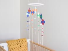 A sweet, colorful diy kite mobile to decorate your child's bedroom or baby's nursery.