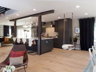 Using an industrial beam as a support header is unconventional but fits perfectly with this beautiful custom kitchen.