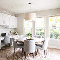 Contemporary White Breakfast Nook With Built In Cabinets And Desk With Pendant Light