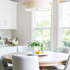 Contemporary White Kitchen Breakfast Nook With Modern Pendant