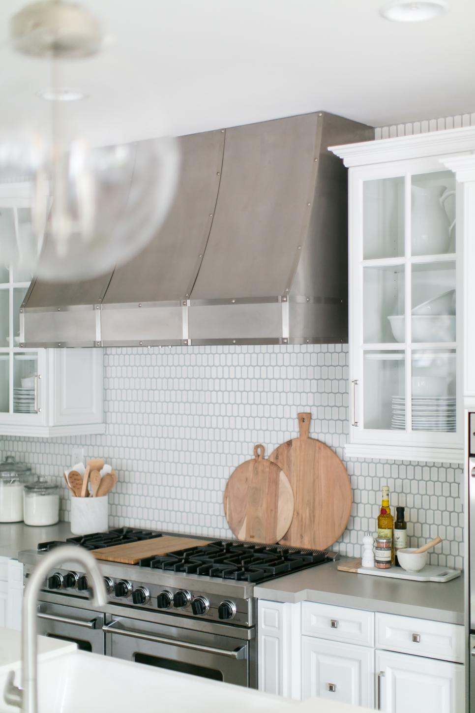 Contemporary White Kitchen With Stainless Vent Hood And 