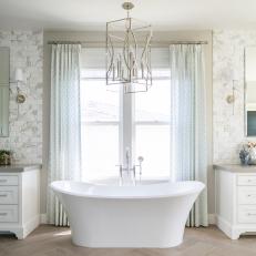 Gray Spa Bathroom With Long Curtains