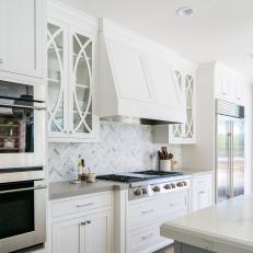 White Transitional Chef Kitchen With Gray Countertops