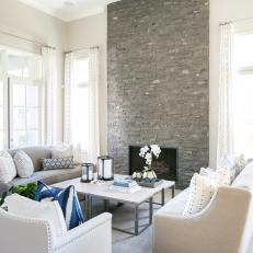 White Transitional Living Room With Stone Fireplace
