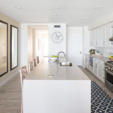 Contemporary White Galley Kitchen With Modern Work Island And Bar Stool Seating