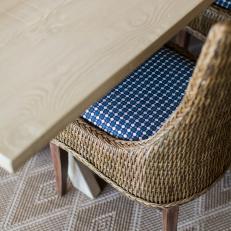 Contemporary Dining Table With Natural Woven Dining Chair And Blue Upholstery