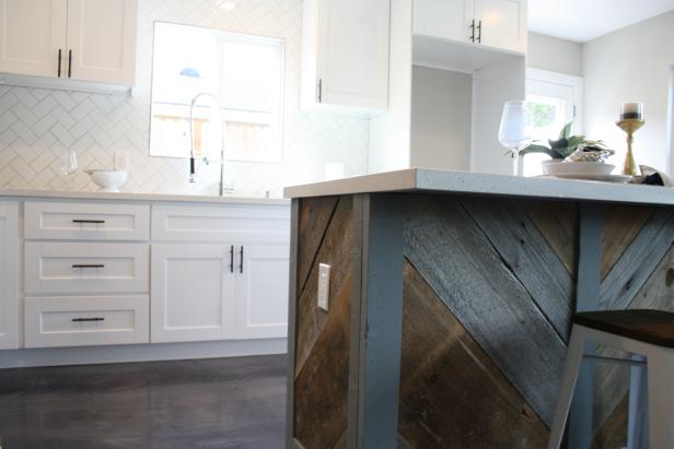 Adding reclaimed wood to the island gives a unique look to this kitchen in Costa Mesa, CA as seen on HGTV's Flip or Flop. (After)