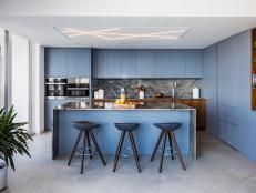 Modern Condo Blue Kitchen With Bar Stool Seating