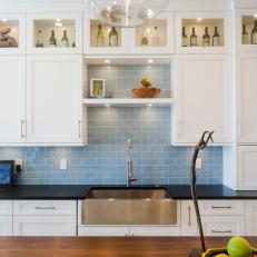 Transitional Kitchen Pairs White Cabinets, Blue Backsplash