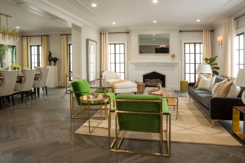 The living room of Drew Scott and fiancé Linda Phan’s newly renovated home in Los Angeles, where the new fireplace mirrors the oroginal one, as seen on Property Brothers at Home: Drew’s Honeymoon House.