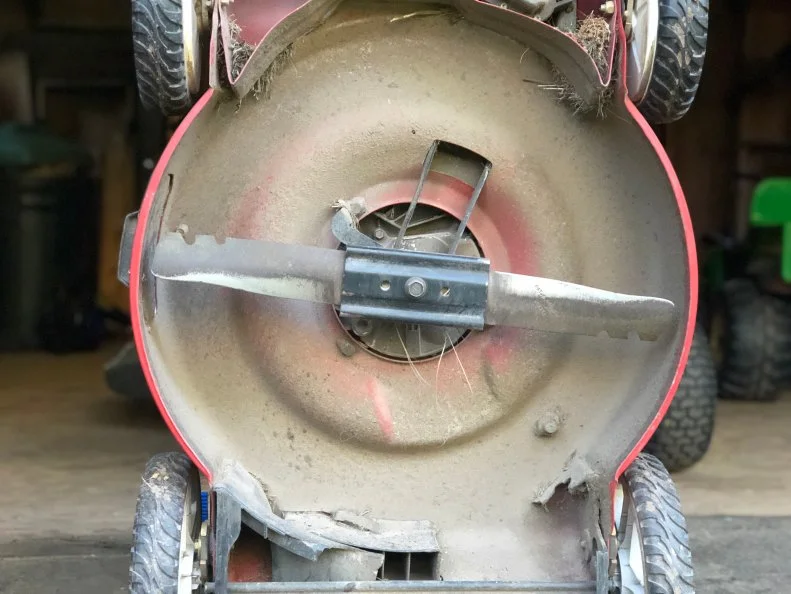 Remove and sharpen your lawn mower blade.