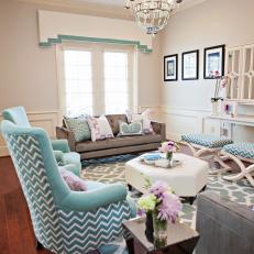 Traditional Neutral Living Room With Blue Chairs And Gray Sofas