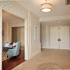 Traditional Sorority House Hall With Blue Wallpaper and Neutral Accents