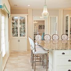 Traditional Eat In Kitchen Detail With Marble Counter And Bar Stools