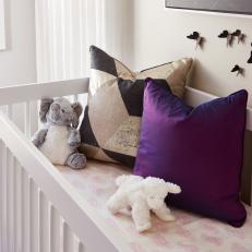 Contemporary Nursery With Purple Pillow