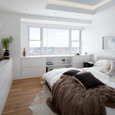 Soothing White Master Suite Overlooks NYC