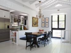 Black and White Kitchen/Dining Area with Banquette Seating 