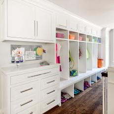 White Mudroom With Colorful Baskets