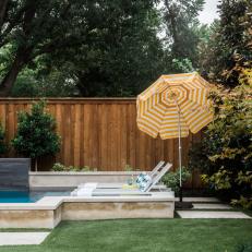 Contemporary Backyard Pool with Retro Umbrella