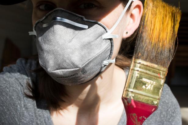 Activated charcoal-lined respirator to trap smells.