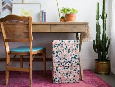 Kick boring to the curb with these fabric-wrapped storage bins that will satisfy both the pretty and the practical in your life.