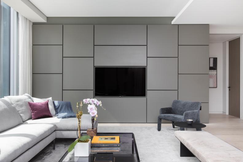 contemporary living room with gray wall