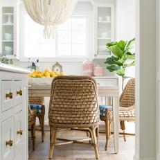Mudroom Flows Into Bright White Dining Area
