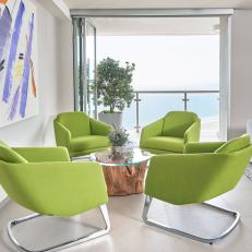 Green Armchairs Create Colorful Sitting Area