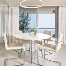 Crisp White Dining Room With Custom Table