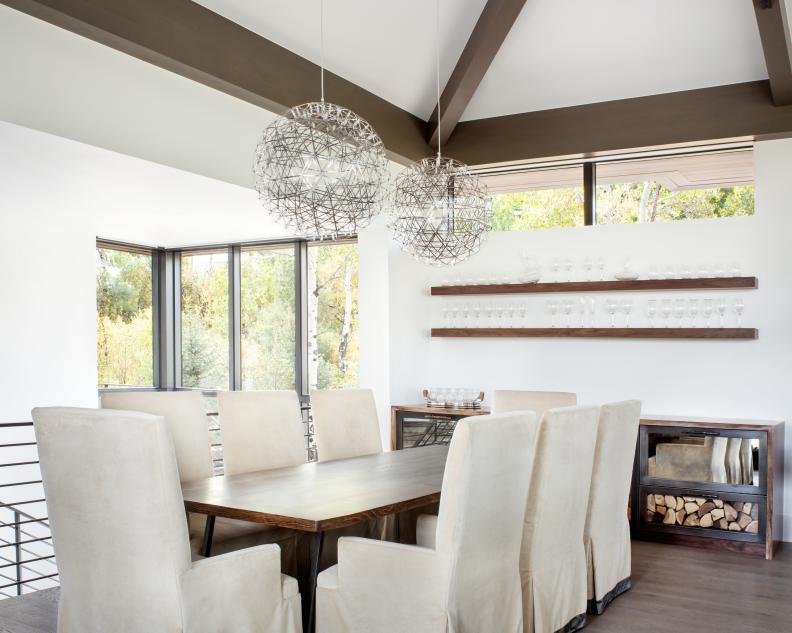 contemporary dining room with slipper chairs