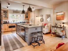 open-concept kitchen with large gray island