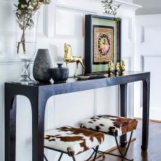 Eclectic Foyer With Chic Black Console Table