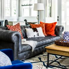 Living Room Sofa Layered With Colorful Pillows