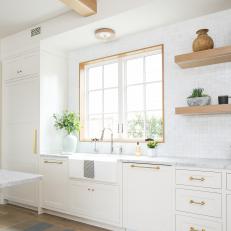 Farmhouse Sink and Charming Wood-Trimmed Window