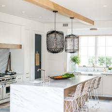 Modern White Kitchen With Marble Waterfall Island