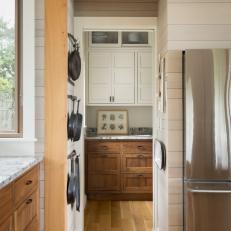 Neutral And White Cottage Kitchen Pantry Detail With Cast Iron Pans