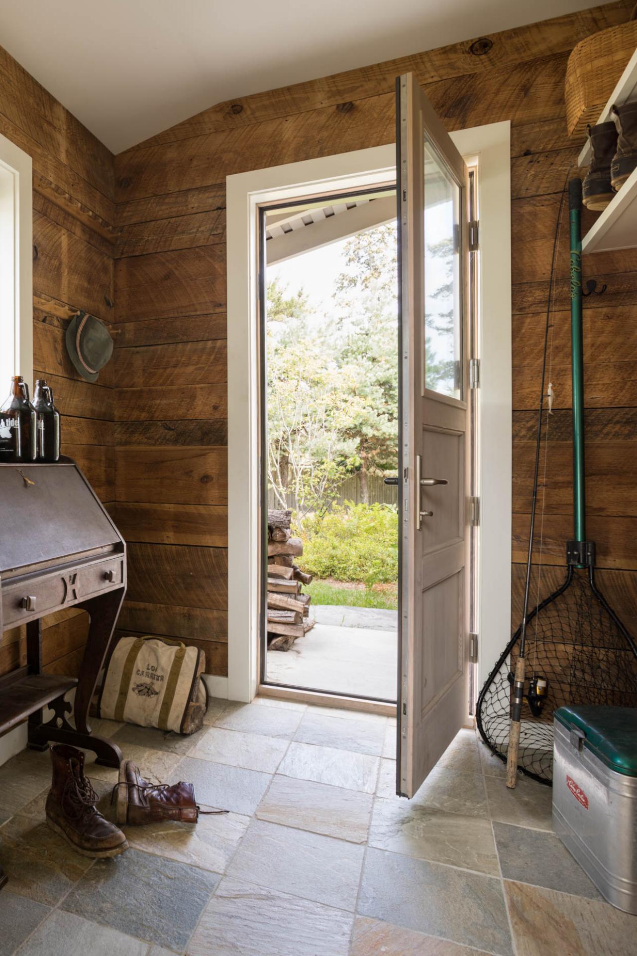 Rustic Cottage Mudroom With Wood Walls And Stone Tile Floor Hgtv