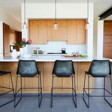 Modern Open Kitchen With Gray Barstools