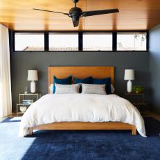 Contemporary Gray Master Bedroom With Blue Rug