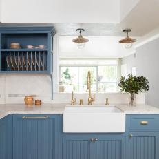 Bright White Kitchen With Blue Cabinets