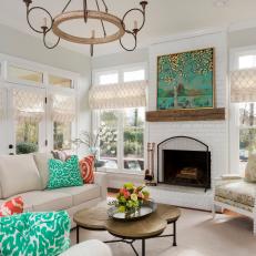 Teal Painting, Pillows Enliven Transitional Living Room