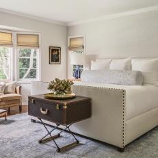 Stylish Master Bedroom With Vintage Louis Vuitton Suitcase