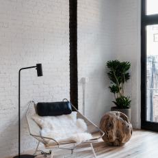 Contemporary Sitting Area With White Brick