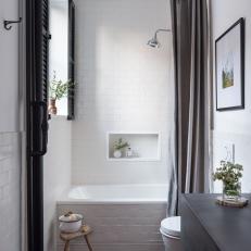 Black and White Small Bathroom With Gray Shower Curtain