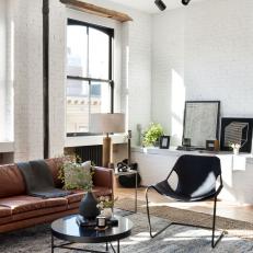 Contemporary Loft Living Room With White Brick