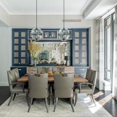 Contemporary Dining Room With Gray Leather Chairs