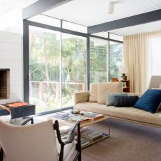Midcentury Modern Living Room With White Fireplace