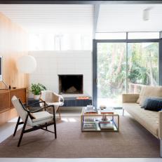 Midcentury Modern Living Room With Wood Paneling