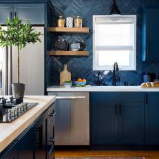 Casual and Friendly Kitchen with Dark Blue Cabinets